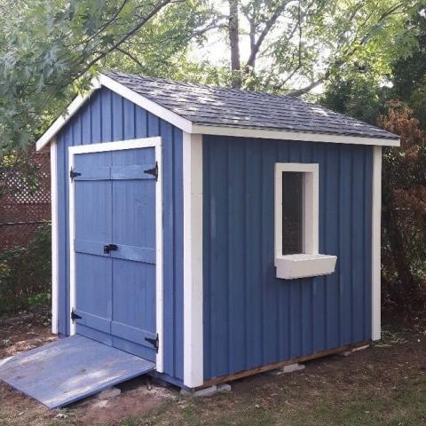 8 x 10 high board and batten with double doors and a ramp.