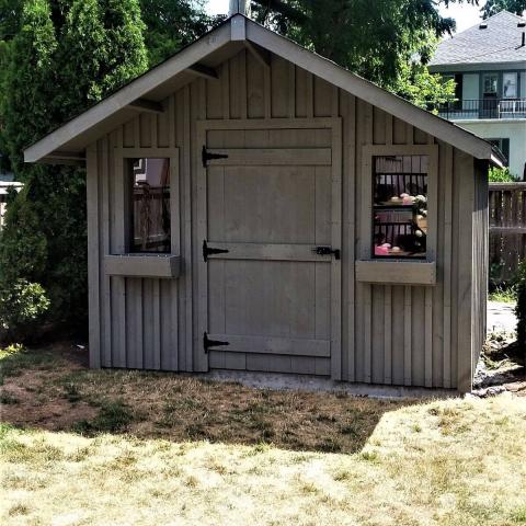 10 x 10 medium board and batten with a 2 foot gable overhang.