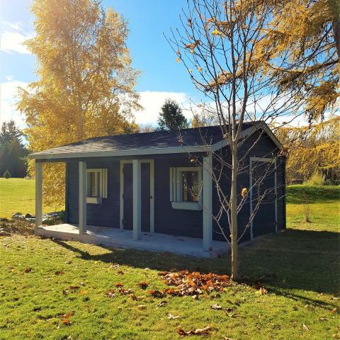 10 x 20 high classic with double doors and a 4 foot side porch.
